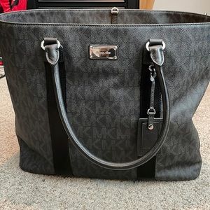 Michael Kors logoed luggage carry bag